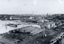 a black and white photo of a harbor