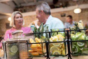 a couple of people that are sitting at a table