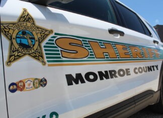 a sheriff car parked in a parking lot