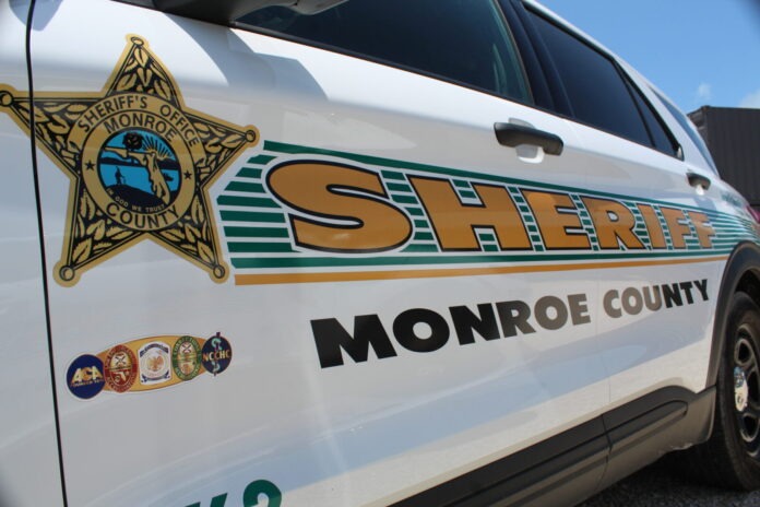 a sheriff car parked in a parking lot