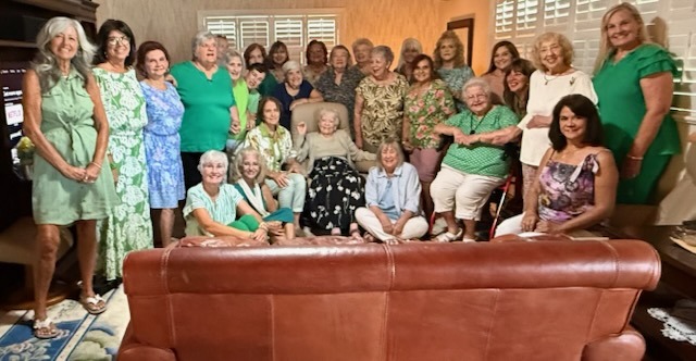 a large group of people are posing for a picture