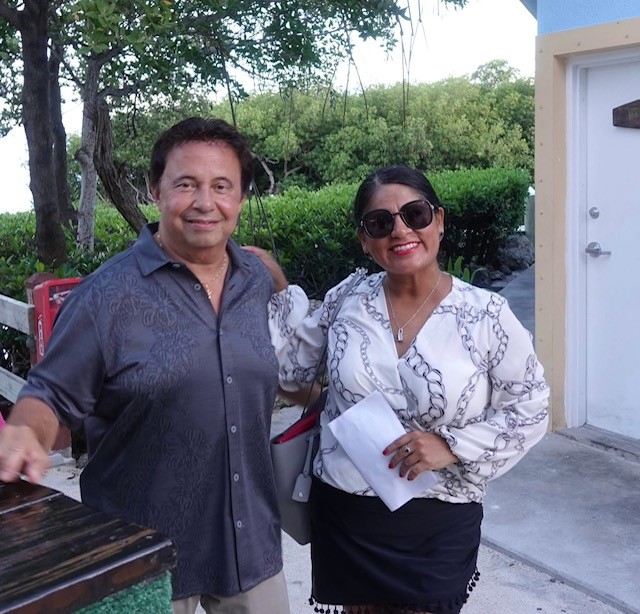 a man and a woman standing next to each other