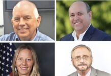 four headshots of people in suits and ties