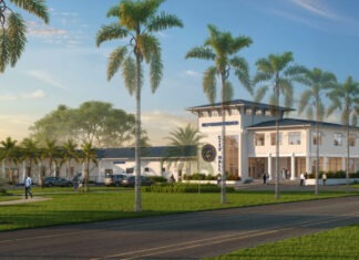 KEY COLONY COMMISSION SETTLES ON FINAL CITY HALL DESIGN an artist's rendering of a building with palm trees in front of it
