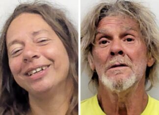 a couple of people that are smiling for the camera