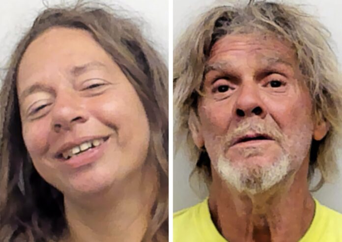 sss a couple of people that are smiling for the camera