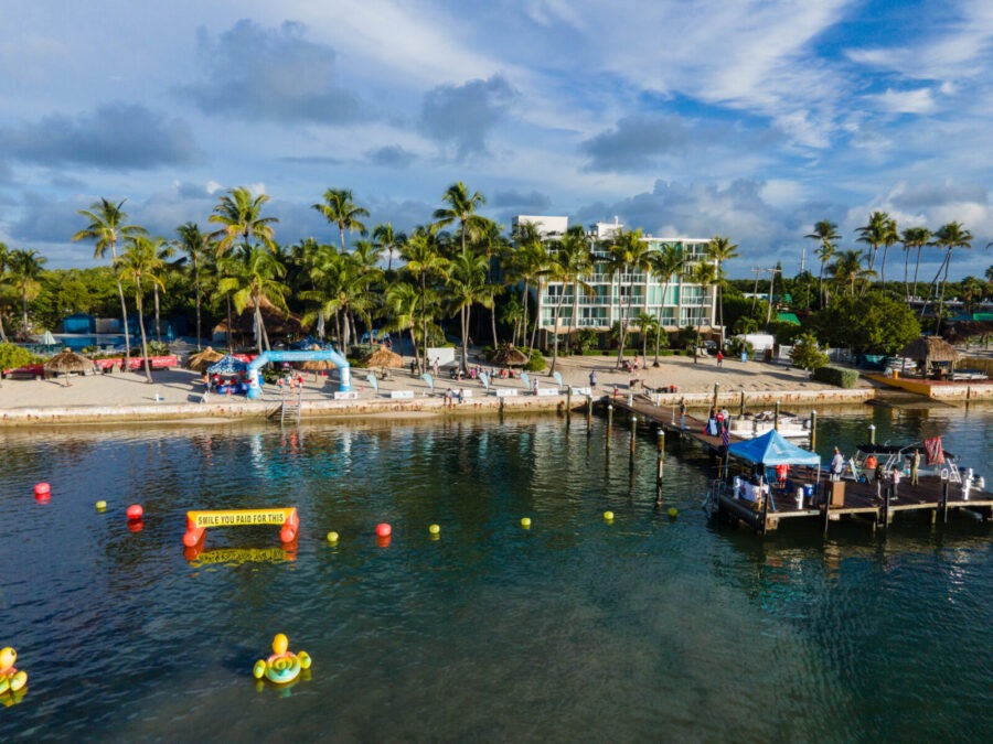 an aerial view of a dock and a resort