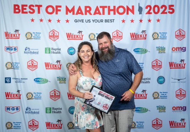 a man and a woman posing for a picture