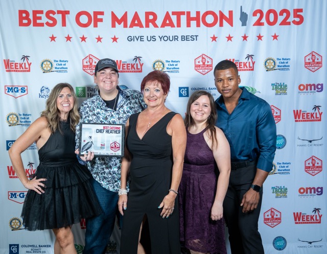 a group of people standing next to each other