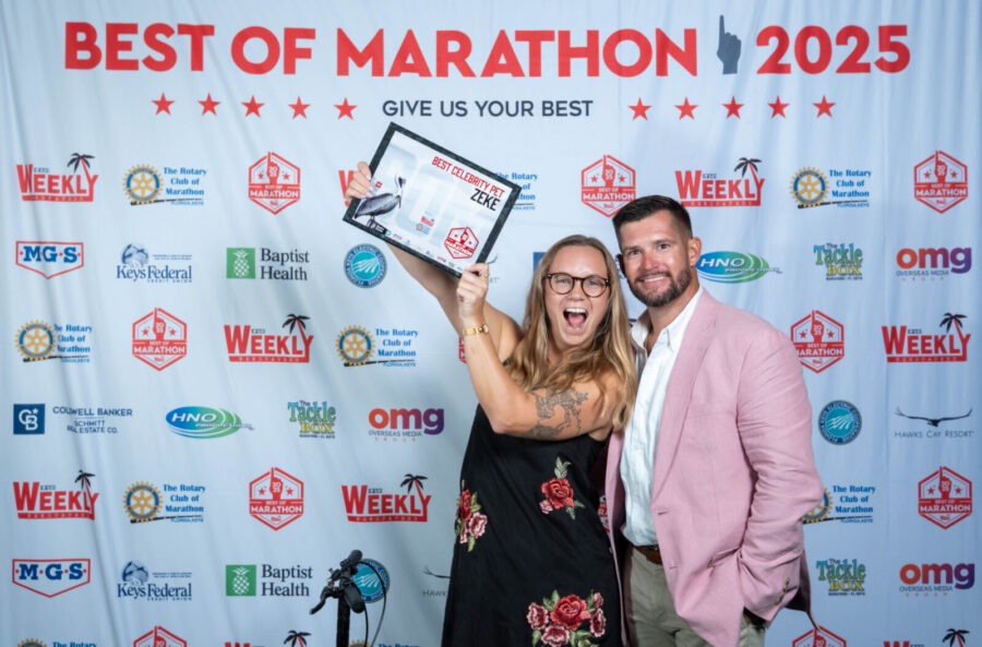 a man and a woman posing for a picture