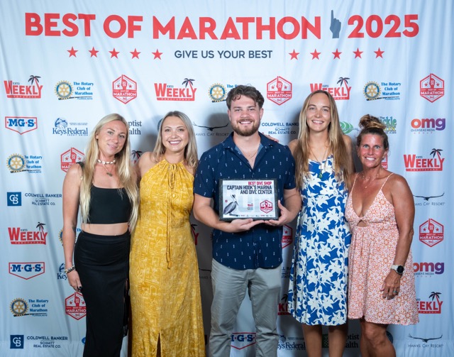 a group of people standing next to each other