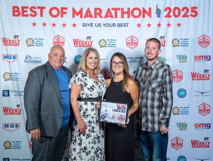 a group of people standing next to each other