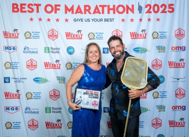 a man and a woman posing for a picture