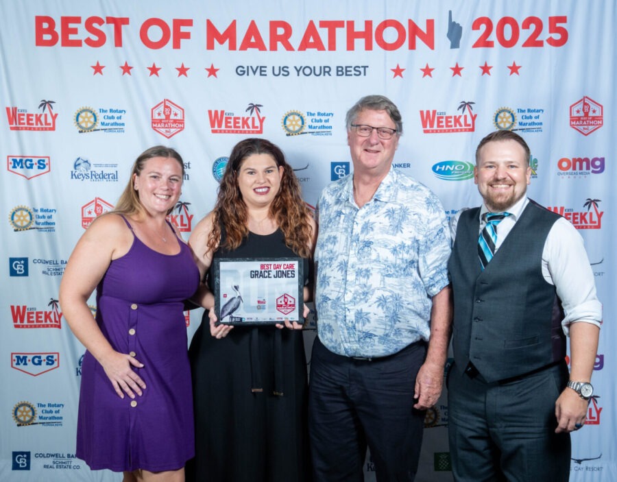 a group of people standing next to each other