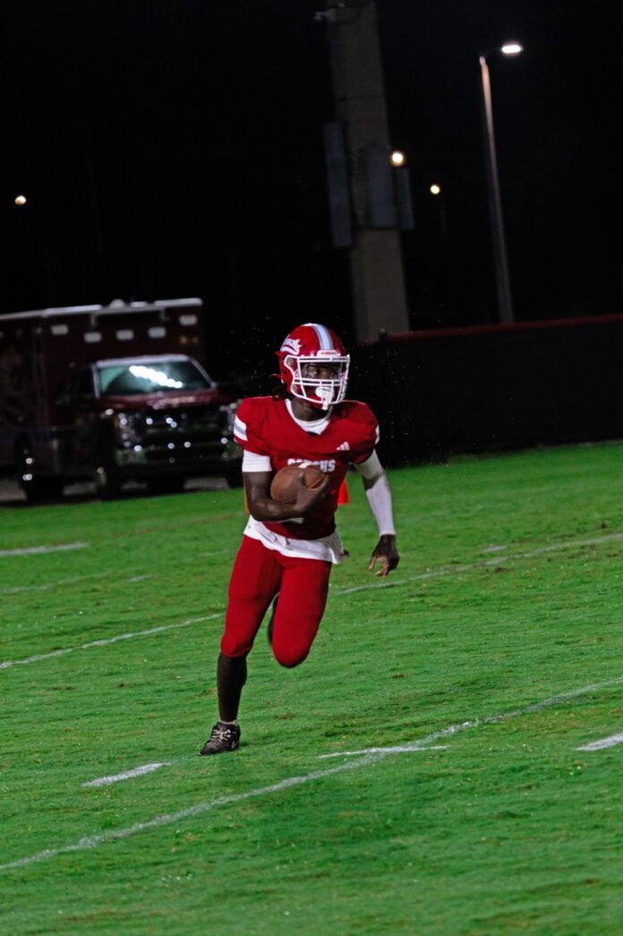 a group of young men playing a game of football