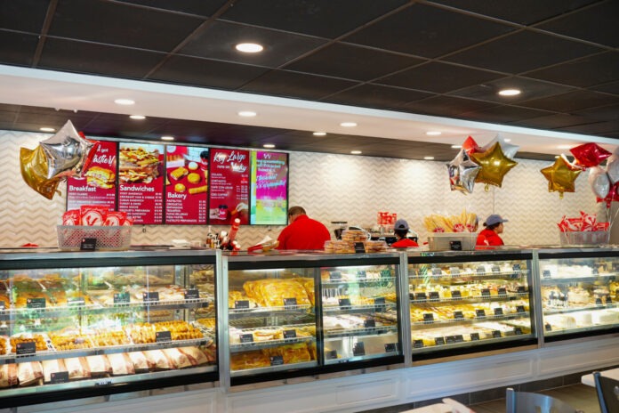 a deli with a lot of food inside of it