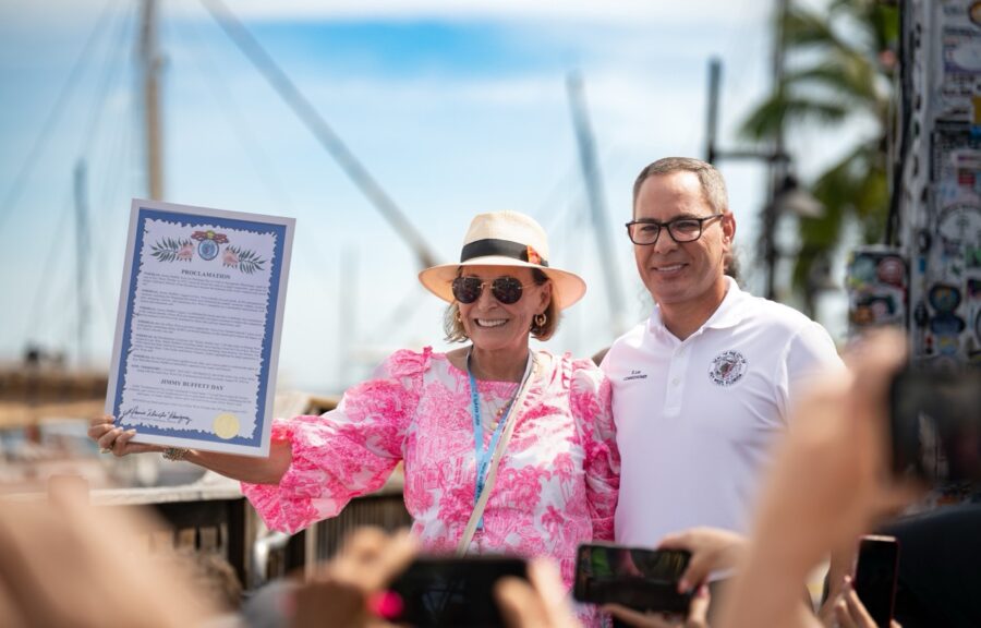 a man and a woman standing next to each other