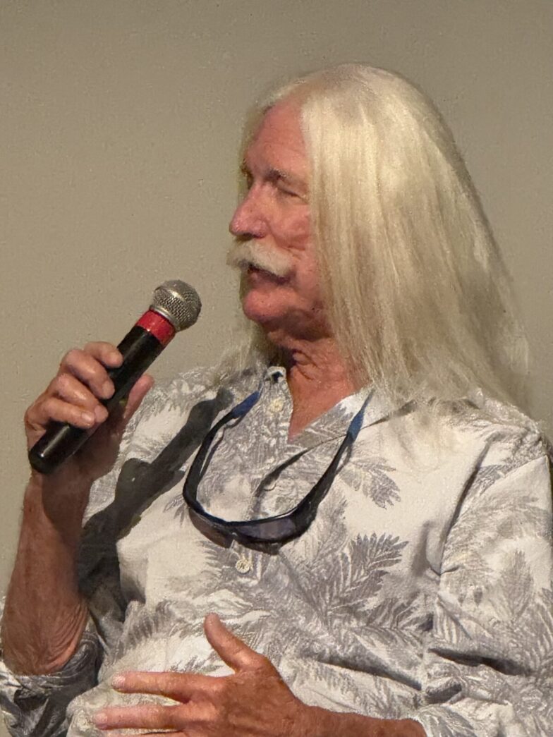 a man with a stethoscope on his neck