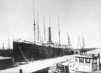a black and white photo of a large ship