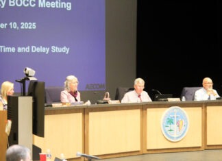 a group of people sitting at a table