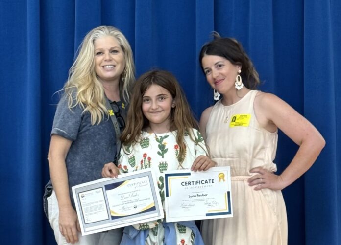 IMG_8504 a group of women standing next to each other