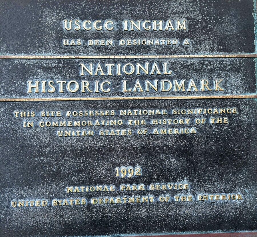 a plaque on the side of a building