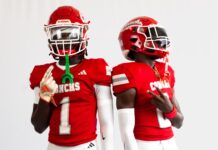two football players in red and white uniforms