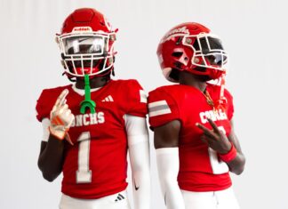 two football players in red and white uniforms