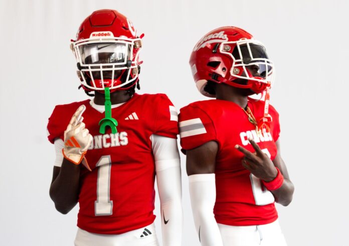 two football players in red and white uniforms