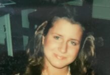 a young woman is posing for a picture
