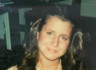 a young woman is posing for a picture