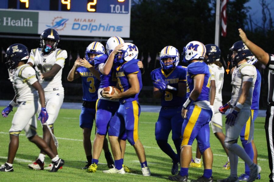 a group of football players on a field