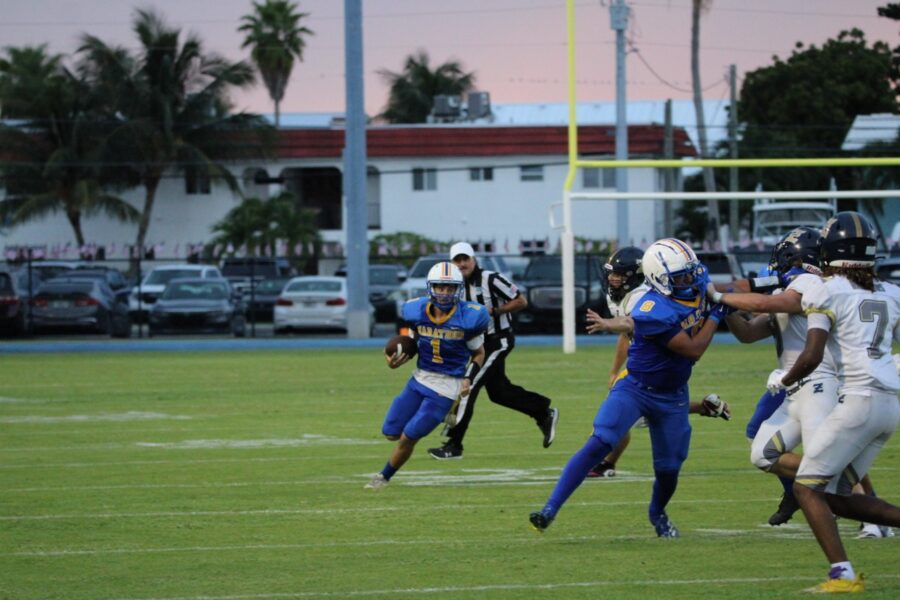 a group of people playing a game of football