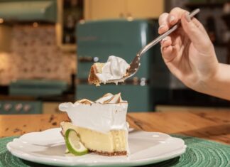 WHAT’S COOKING KEY WEST? ‘A SEAT AT THE TABLE’ KIDS ETIQUETTE LESSONS EXPAND CONFIDENCE a person is eating a piece of pie with a fork