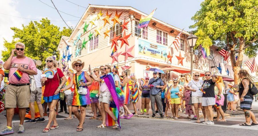 a group of people walking down a street