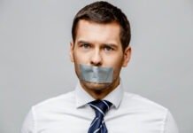 a man with duct tape on his mouth