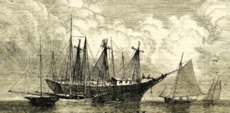 an old picture of a boat in the water