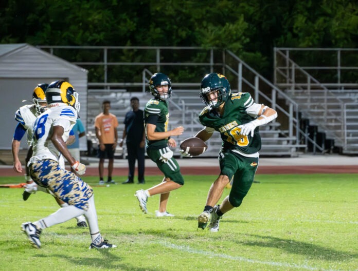 091225 Weekly CSHS vs SmartEn Sports Academy HR dfp-86 a group of people playing a game of football