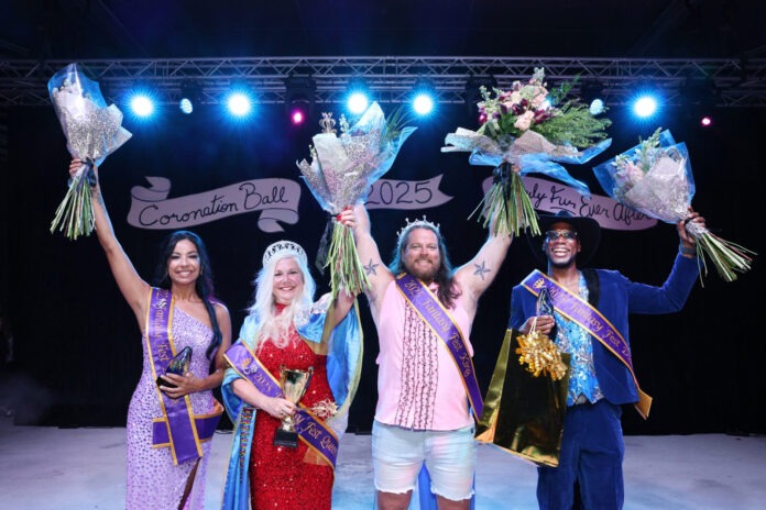a group of people standing on top of a stage