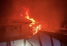 a house on fire at night