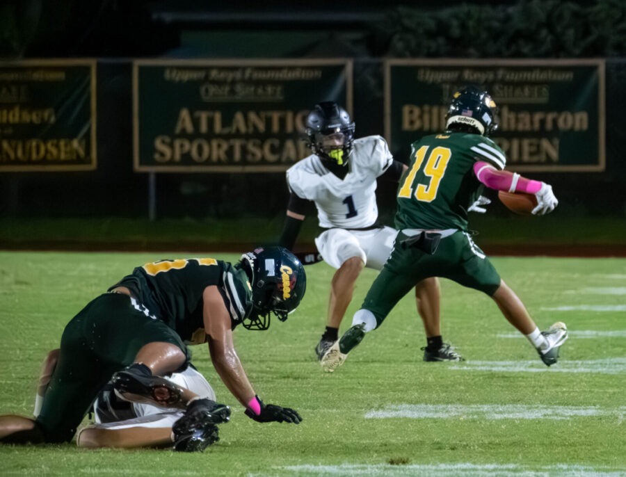 a group of young men playing a game of football