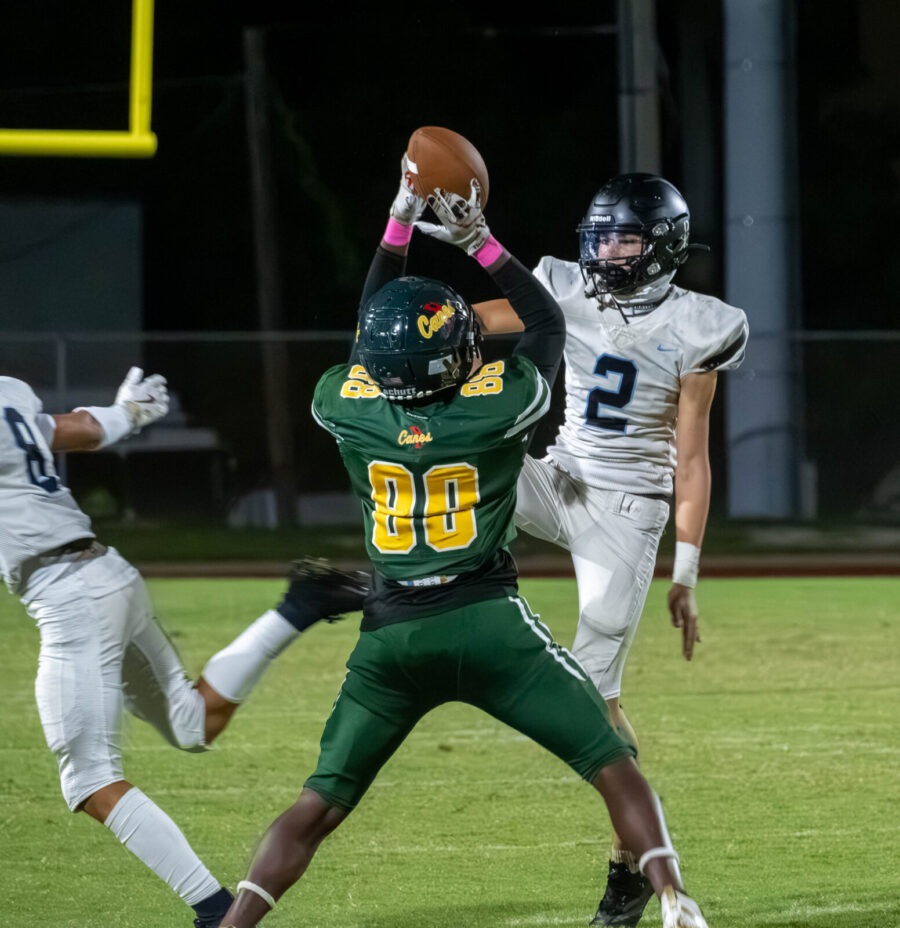 a group of young men playing a game of football