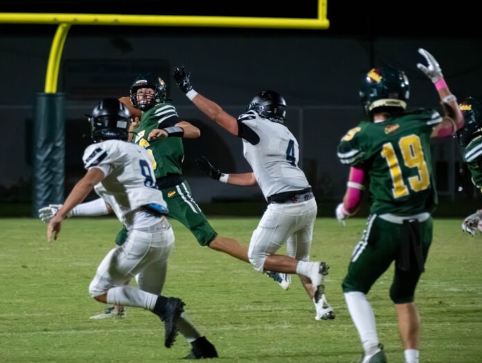 a group of young men playing a game of football