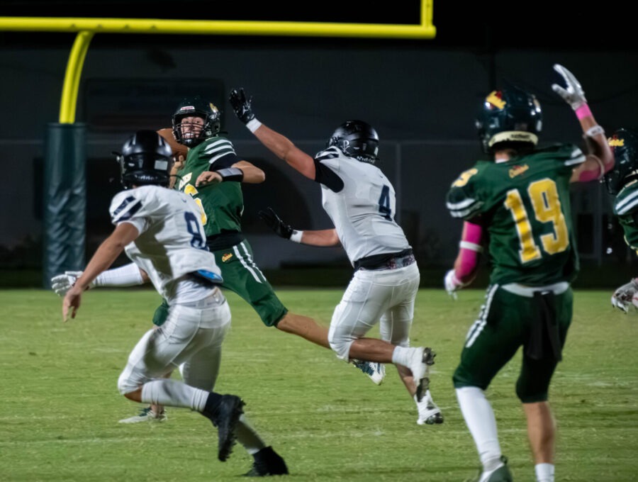 a group of young men playing a game of football