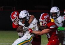 a group of young men playing a game of football