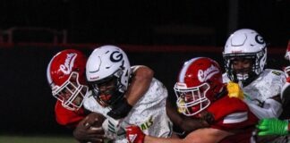 a group of young men playing a game of football