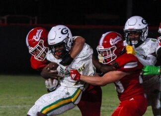 a group of young men playing a game of football