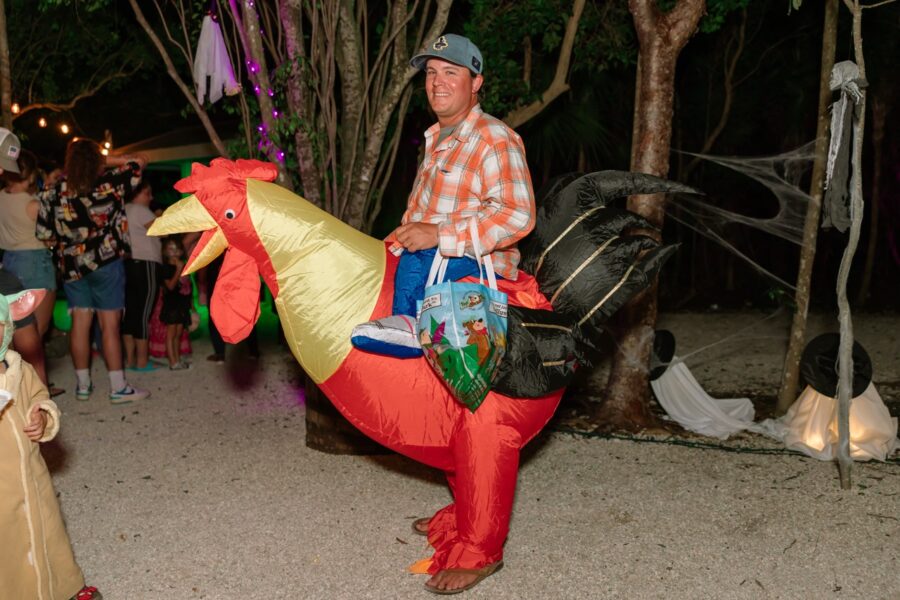 a man riding on the back of a large inflatable horse
