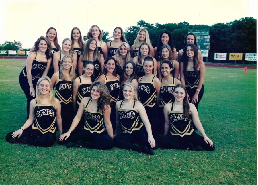 a group of cheerleaders posing for a picture