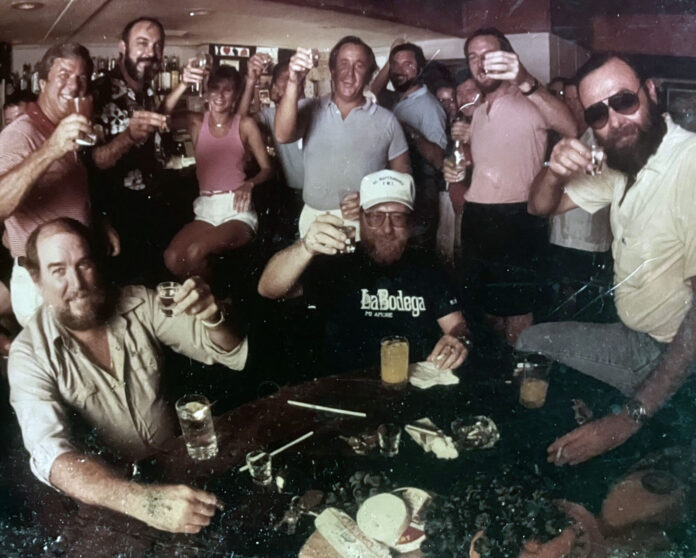 a group of people are posing for a picture